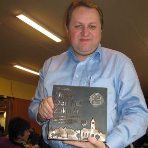 Torsten Kuhlmann mit Silberplakette